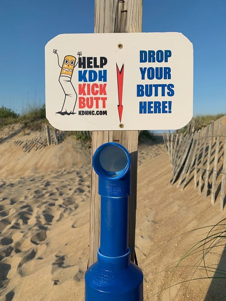 Cigarette butt receptacle at beach access